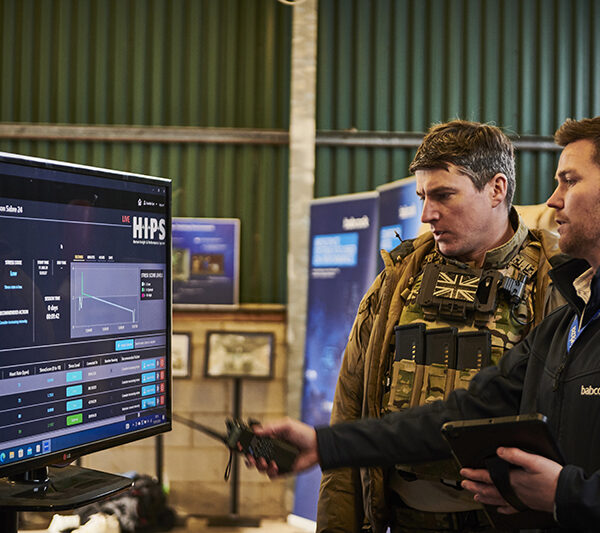 A member of the Babcock team demonstrates new training tool to an Army representative