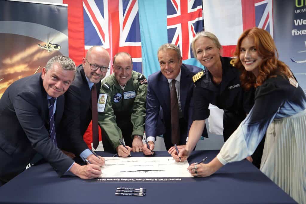 Simon Tate of Draken, Emlyn Taylor of Lockheed Martin, Air Commodore Rob Caine RAF, Tim James of Ascent Flight Training, Captain Polly Hatchard Royal Navy, and Chloe Barker of Babcock.