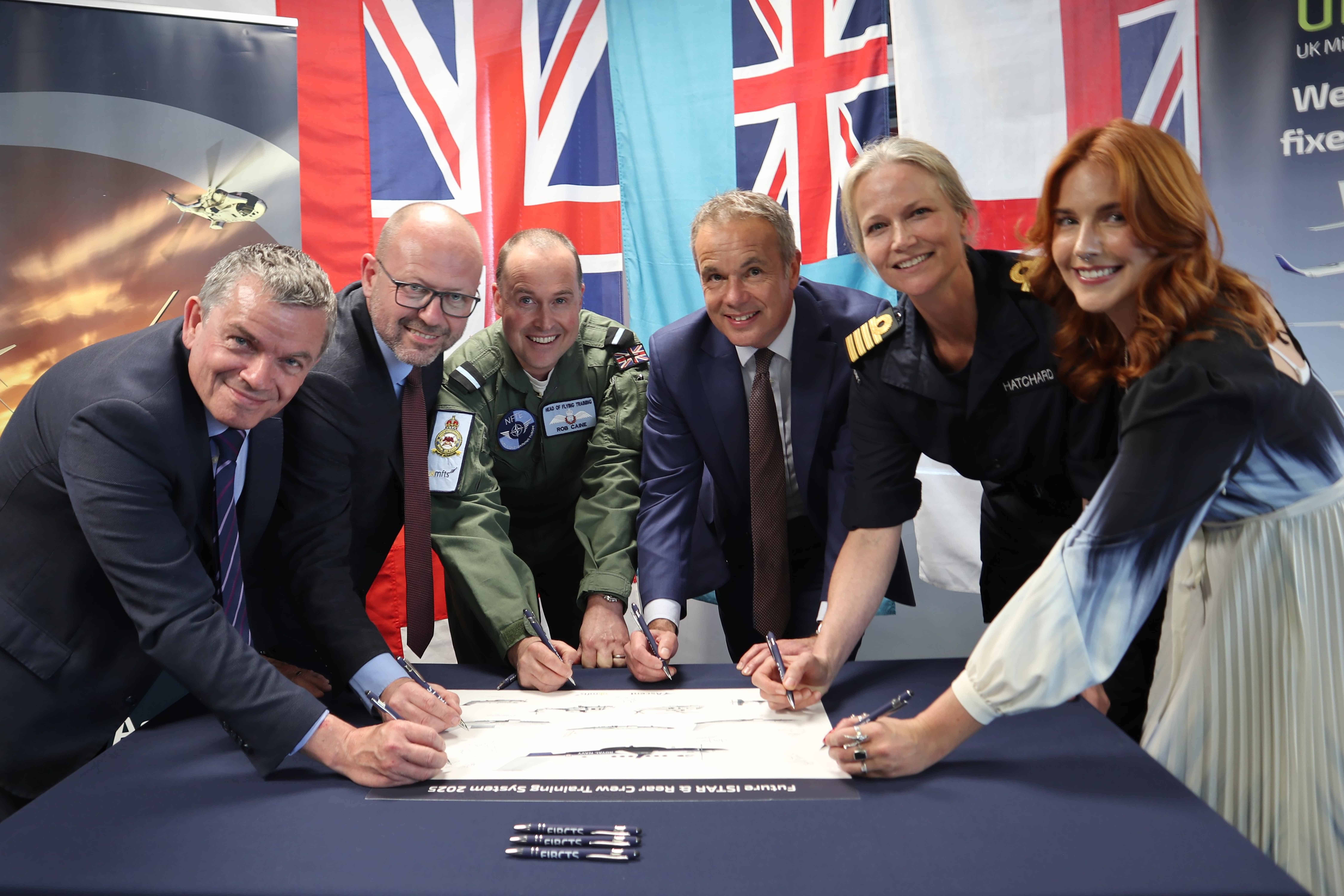 Simon Tate of Draken, Emlyn Taylor of Lockheed Martin, Air Commodore Rob Caine RAF, Tim James of Ascent Flight Training, Captain Polly Hatchard Royal Navy, and Chloe Barker of Babcock.
