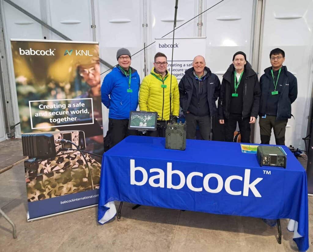 Team at a Babcock stand at the Army Warfighting Experiment’s (AWE) Distinguished Visitors’ Day