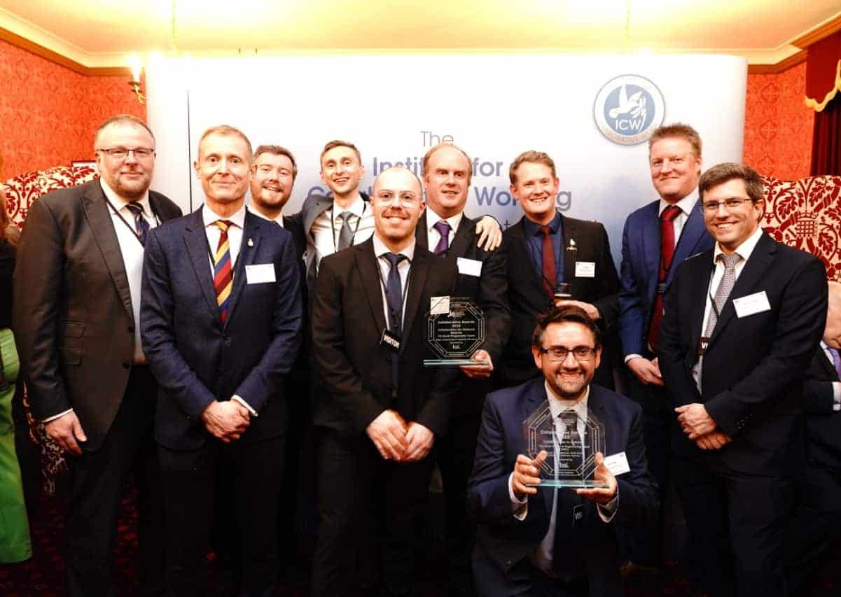 Group photo of the teams with their trophies at the Institute of Collaborative Working Awards