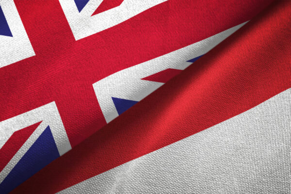The image shows parts of both the UK and Indonesian flags.