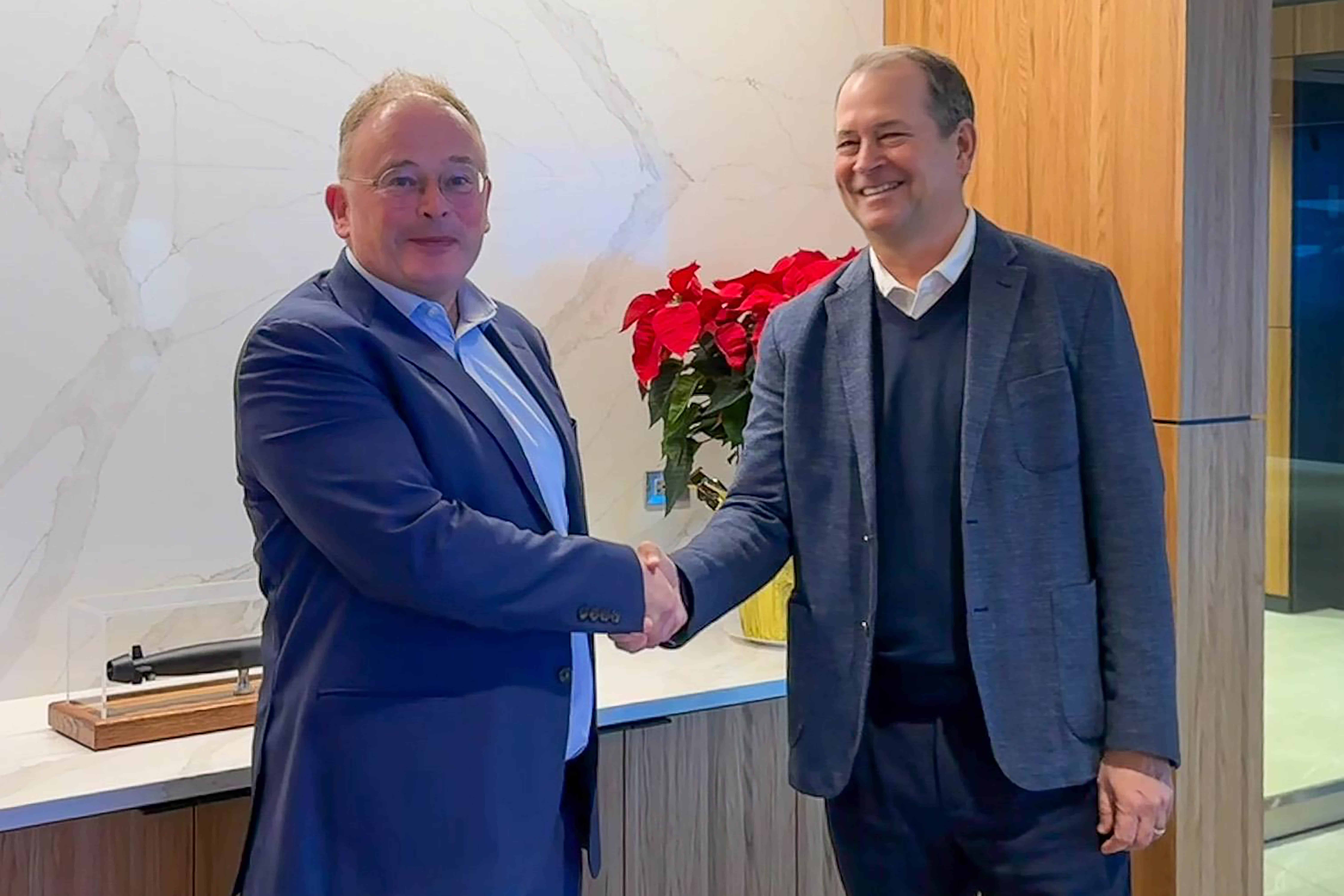 David Lockwood CEO Babcock with Chris Kastner, HII president and CEO Virginia-Class deal